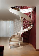 The staircases are built with no central support, giving more focus to their curved form.