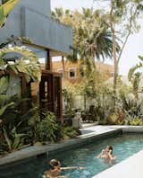 Sophie and Colin enjoy their new pool, the only non-solar-powered portion of their home in Venice, California, created by their father, architect David Hertz. Read the full article here.
