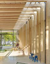 Carlsson used the same materials and timber sizes indoors and out to maintain a unified character throughout the pavilion.