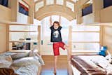 Debbi Gibbs’s son Blake had one primary design requirement: bunk beds. Specifically, he wanted "two sets of single bunks, one on each side, with a bridge over the top." Gibbs says the Venetian-style arched bridge connecting the two beds exceeded her expectations: "I was expecting a flat platform, but our builder decided to take Blake’s request (to connect them) and made him his very own Bridge of Sighs."