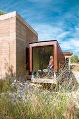 Roger and Mary Downey’s 3,200-square-foot rammed-earth home seems to float next to the forest along the Rio Grande in Corrales, New Mexico. While the home’s design and materials nod to the neighboring adobe farmhouses and agricultural sheds, architect Efthimios Maniatis of Studio eM Design calls them an amalgam of "modern contemporary regionalism," governed by Roger’s strict mandate for minimalism.
