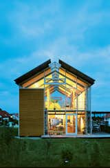 Exterior, House Building Type, Wood Siding Material, Metal Siding Material, and Glass Siding Material Photo courtesy Reinhold Andris Office, Walddorfhäslach.  Photo 1 of 1 in Steel Framed Split-Level Home in Germany