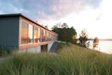 Ziger/Snead Architects constructed this ode to rowing in rural Virginia for a Baltimore couple who share a love of sculling. “Everywhere in the house you can see the moment where land meets water,” says Douglas Bothner, an associate at the firm.