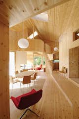 The double-height ceiling and knotty interior give the Cabin Nordmarka a pleasant lightness, despite being situated deep in the Norwegian forest.