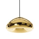 The Void by Tom Dixon is a solid brass pendant light that references Olympic medals. After being hand polished, the tubular fixture is then lacquered to maintain a high gloss finish.