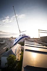 The artist Erwin Wurm constructed a piece specifically for the hotel. He and his team created a replica of a boat that appears to be dripping off the 7th floor of the hotel.
