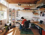 A preoccupation for Levine was saving space and money; he and his team used threaded steel rods and birch veneer plywood to construct the shelving in his office at the rear of the house.