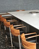 The Antonio Citterio walnut-back Morgan chairs are also from Flexform.