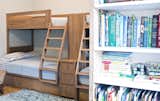 For a family with three young children, Brooklyn-based furniture company Urbangreen devised durable, modern bunk beds. Storage beneath the beds helps keep the room uncluttered. Urbangreen specified robust, soft-closing steel runners for the drawers.