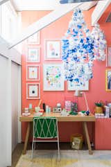 The kids' room designed by Lucy Feagins is especially vibrant, with Tango-painted walls by Delux, artwork by Rachel Castle and Beci Orpin, handmade beaded chandeliers by Emily Green, and a kicky pineapple lamp by Down to the Woods. 