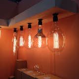 Pick your Edison bulb poison: filaments in creative shapes from Tiab Inc.  Search “spinning bh2 pendant light large black” from Home Design Finds from NYNow 2015