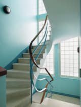 The apartment can be reached by a winding staircase.