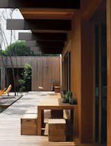 The courtyard deck is also made of tallowwood, a native eucalyptus. White mahogany—a dense timber that is termite resistant—clads the exterior. The sustainably sourced timbers are also fire resistant, a crucial feature in Australia in light of frequent drought and resulting forest fires.