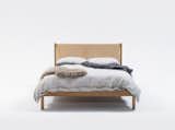 While leather is often found in chairs and sofas, the Australian furniture company Jardan has applied the material to a headboard on the oak-framed Finley design.