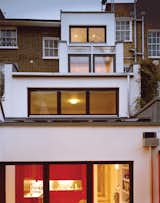 On an eight-foot-wide site in London, architect Luke Tozer cleverly squeezed in a four-story home equipped with rain-water-harvesting and geothermal systems. Read more about this beautiful slim cottage here.  Photo 5 of 5 in Black Sheep by Jami Smith from Modern Rear Facades