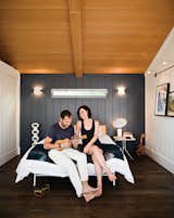 Bedroom, Bed, and Dark Hardwood Floor “There’s a soulfulness in this small house that’s impossible to replicate in something completely new. The sweetness truly lingers," says architect Michael Lee.   Photo 1 of 18 in Less is More in this Manhattan Beach Bungalow