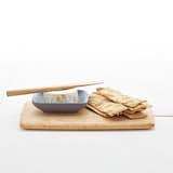 Warm wintry grey is a nod to the season in this Appetizer Set, which includes a mini condiment plate, and Edward Wohl cutting board and pate knife.
