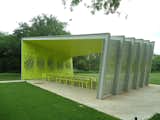 The arresting lime-green interior makes the pavilion at once blend with and stand out from its surroundings. Photo by Architexas.  Search “6 tiny modern pavilions” from A Modern Park Pavilion Rises in Dallas
