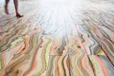 Pernille Snedker Hansen has repurposed an old marbling technique giving Nordic wood a supernatural, organic, colourful and vibrant pattern. The wooden planks for "Wave" are made one by one, and thus each floor board acquires a unique pattern of coloured stripes.  Photo 5 of 9 in Four Danish Designers You Need to Know Now