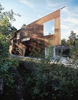 Exterior, House Building Type, and Wood Siding Material The Triangle House was completed in 2006, and its natural materials and geometric form equally embrace the surrounding forests and ocean.  Photo 14 of 27 in modern by Joseph Nunez from Fjord Focus