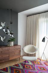 Organic comfort meets modern functionality in the Grasshoper Lamp. In a corner of this Brooklyn Brownstone, a black Greta Grossman Grasshopper lamp sits next to a Bertoia Diamond chair with matching ottoman.  Kyle van der Velde’s Saves from Design Classic: Bertoia Seating Collection