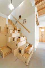 Wood Tread, Wood Railing, Under Stairs Storage Type, and Staircase Photo by Osamu Abe  Photo 5 of 24 in Unabashedly Strange Houses in Japan by Luke Hopping from Top Drawer