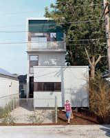Julie Charvat of Bild Design exits the Lowerline House. Raised three feet off the ground—rather than slab on grade—the house is well equipped to battle any incoming flood waters.  Photo 2 of 11 in New Orleans, LA