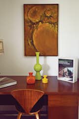 Tucked into one end of the house, a desk by Florence Knoll displays Stacey’s mid-century pottery.  Annie’s Saves from Modern Home in a California Resort Town