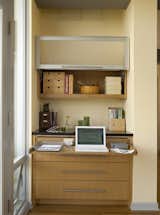 The workstation, open. "This was our solution to providing Karen with a place to work at home," says Sundstrom. "She used to work in the bedroom, but we cut the room down considerably, and we thought it would be best to keep the bedroom as a place to relax."