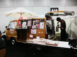 In another portion of the show floor, a more humble operation dedicated to the splendor of coffee takes place out of the back of a van.