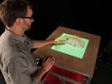 MIT Media Lab's inFORMStudents at MIT developed a dynamic shape display that lets people interact with digital information in a tangible way. Watch his video to see it in action: