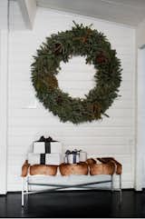 Large Natural Wreath

If you really prefer the tradition and smell of an evergreen wreath you can still modernize with scale and styling.

via Habitually Chic. Photo by Virginia MacDonald.  Photo 4 of 7 in Modern Wreaths to Welcome Your Guests by Megan Hamaker