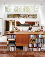 Cohen and his wife, Sally, sit in the dining room, which along with the connected living room, is a focal point of the house, lighted in part by high, remote-controlled clerestory windows.