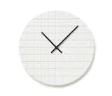Assembly's gridded wall clock, made exclusively for the Sight Unseen shop, is a thin, white PVC disc with a carved grid and reversible hour/minute hands that can be switched between black and white. "And the grid itself," according to the site, "rather than just being for decoration, was chosen for its combination of regularity and infinite possibility."