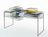 Ying Chang's Grid System desk sports a plethora of wire cages that function as easy-to-see storage cubbies.
