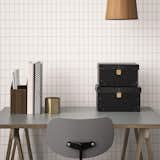 Office, Chair, and Desk Apply the grid look from floor to ceiling with Ferm Living's WallSmart wallpaper, a new generation of non-woven wallpaper that is supposed to be easier and faster to hang.  Photo 9 of 14 in 7 Wallpaper Designs That Will Instantly Revamp Your Space from Grids Are the Zeitgeisty Graphic Motif of 2015