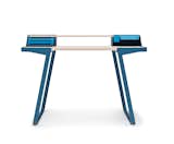7 Bis Repetita Desk

The trestle–style writing desk is framed in navy with brighter blue accents on the movable, sliding drawers up top.