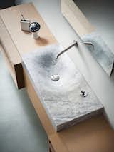815 Washbasin by Benedini Associati for Agape Design

The asymmetrical form of Agape’s Cararra marble sink is modeled after the effect of water eroding stone.  Photo 5 of 8 in Nature-Influenced Bathroom Fixtures by Kelsey Keith