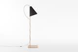 The lamp features a solid beech wood base with a hand-rubbed oil treatment.