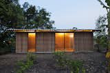 Vo Trong Nghia Architects utilized passive design strategies and a double roof, constructed from Nipa palm and corrugated cement, to ventilate the home, an important consideration in a humid, tropical environment.