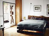 The bed was designed to hang from the ceiling and can be hoisted up and pulled down as needed.