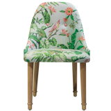 Heima's Arizona chair, upholstered in a tropical print.
