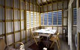 The Everharts added two porches to the form of the original farmhouse, this one for dining.  Photo 6 of 13 in Farmhouse Redux