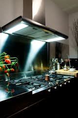 The hood is Gaggenau and the range is by Foster.