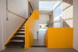 A house by Brazillian firm YTA features yellow accents throughout.  Photo 7 of 7 in Thank Hue! 7 Color-Saturated Homes by Diana Budds