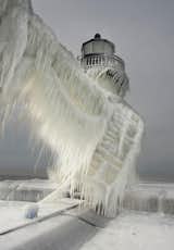 Frozen Lighthouses: Thomas Zakowski made the most of the recent “polar vortex” with his photos of lighthouses at the St. Joseph North Pier on the coast of Lake Michigan. From Bored Panda.