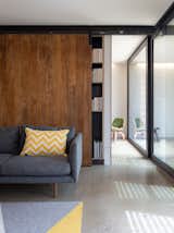 The living room features an operable door which leads to the patio. Photo by Andrew Wuttke.