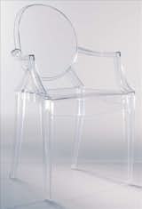 Designed by Phillippe Starck, the Louis Ghost Chair is a reinvention of the classic Louis XV chair. The Louis Ghost Chair features a rounded, oval backrest that delicately rests atop a linear, square seat. Crafted from clear polycarbonate and formed in a singular mold, the Louis is an armchair that can be used both indoors and outdoors. The classic chair is sold as a set of two. 

This set of two chairs, along with other Kartell products, is 15% off until October 22, 2015.  Search “victor-armchair.html” from Furniture and Accessories Picks from Our Semi-Annual Sale