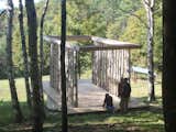 Overhanging rafters establish vestibules at both ends of the structure. Photo courtesy of Moskow Linn Architects.  Photo 2 of 7 in Aspiring Architects Build a Pavilion in the Vermont Forest