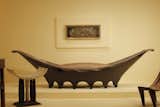 Pirogue Chaise

This sculptural day bed -- a transportive, buoyant piece referencing the canoes of the South Pacific -- was one of many standout pieces Gray created as part of a commission by the esteemd Madame Levy, who asked Gray to design her Rue de Lota apartment.